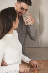 young-couple-cooking-together-home